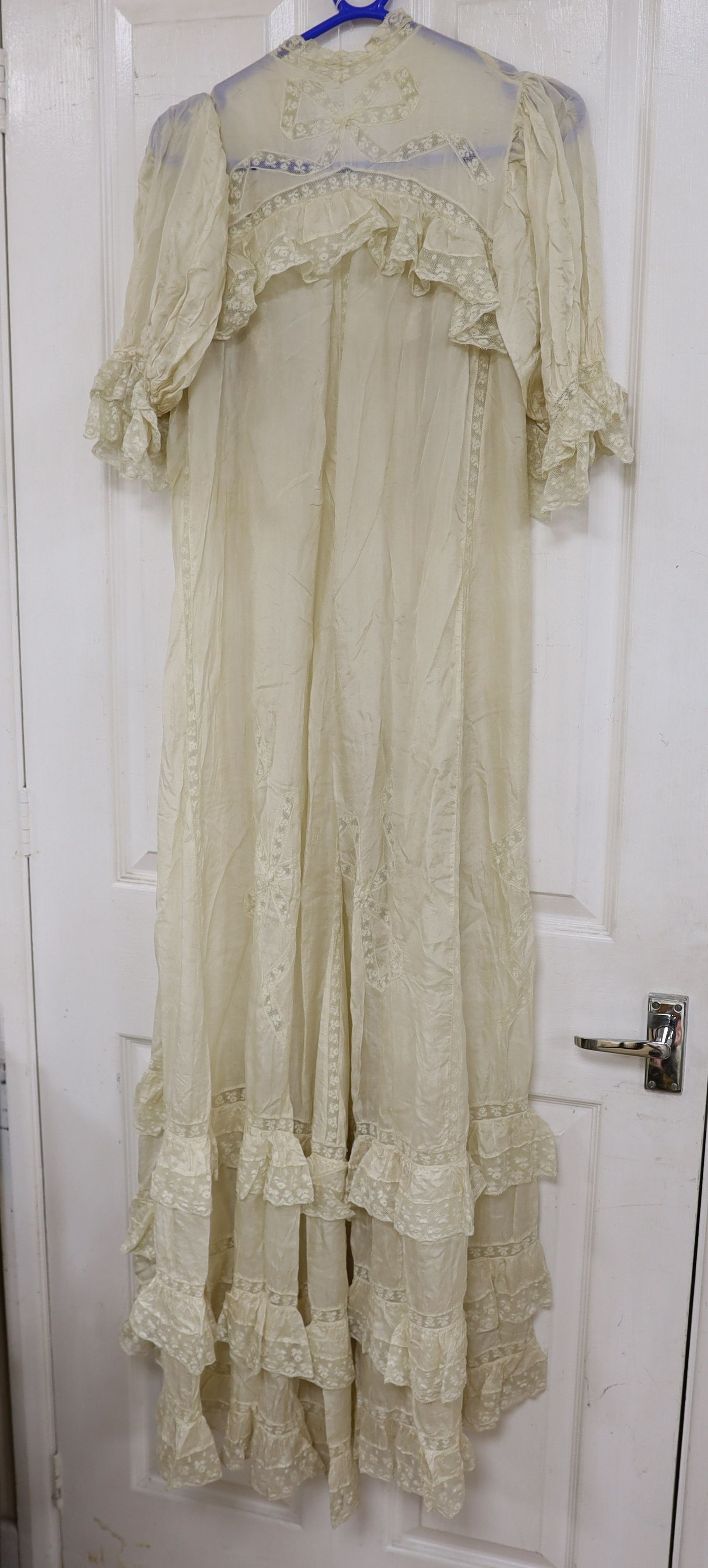 A fine cream silk and lace inserted lady's negligee
